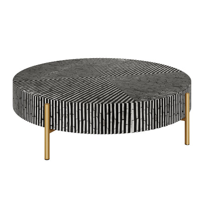Cradily Mother of Pearl Inlay Coffee Table in Ivory & Black features a round top with a radial black-and-white mosaic pattern, supported by slim gold-finish legs, blending elegance and modern design.