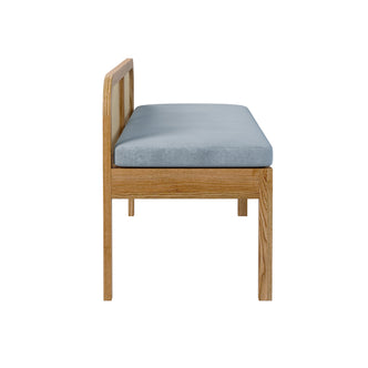 Dana 120cm Solid Oak Hardwood Bench features a solid oak frame with a rattan backrest, a cushioned seat, and visible anti-slip pads, highlighting its sturdy construction and elegant design.
