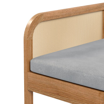 Close-up of Dana 120cm Solid Oak Hardwood Bench - Natural, showcasing its sturdy oak construction, rattan backrest, and cushioned seat, emphasizing the bench's elegant design and functional features.