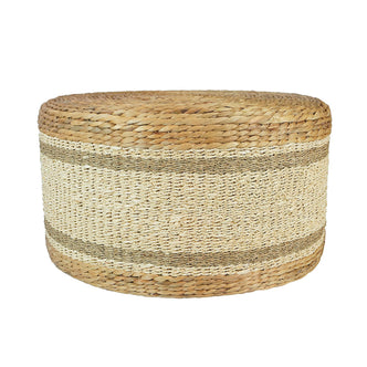 Darcey 75cm Water Hyacinth Ottoman in Natural, featuring a hand-woven, cylindrical design from water hyacinth and seagrass, suitable as a versatile coffee table or seating option.