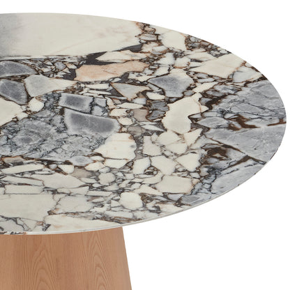 Dina 120cm Round Marble Dining Table in Blue Galaxy Natural features a veined stone tabletop with a light-wood pedestal base, offering a blend of elegant marble and sturdy timber design.