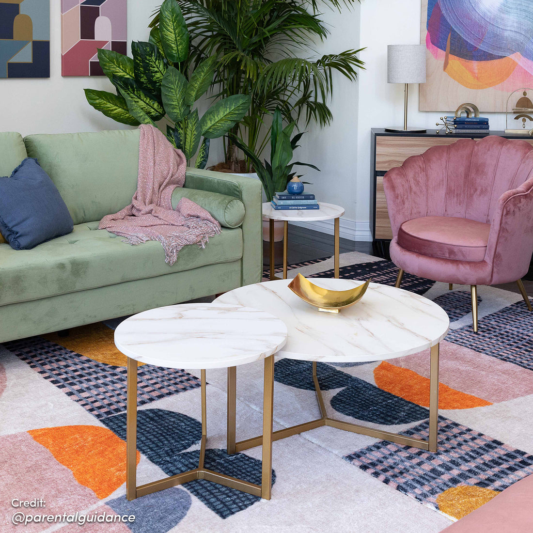 Earl Nesting Coffee Table Set of 2 - Marble features two round tables with marble-look tops and a sleek metal frame, showcasing an industrial-chic design ideal for modern interiors.