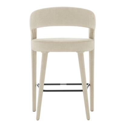Eisha Velvet Bar Stool Beige Set of 2 featuring a close-up of a white chair with sleek black legs, showcasing its luxurious velvet texture, curved backrest, and sturdy metal frame.