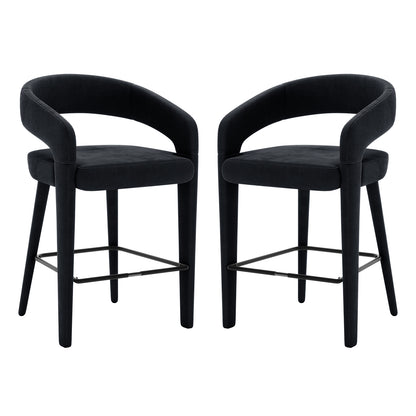 Eisha Velvet Bar Stool Black Set of 2, featuring curved backs with armrests and built-in footrests, upholstered in velvet with thick foam padding on a sturdy metal frame, ideal for modern dining spaces.