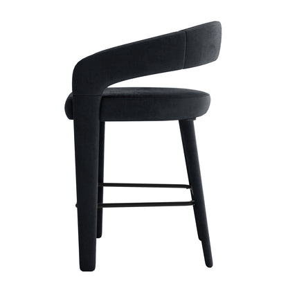 Eisha Velvet Bar Stool Black Set of 2, featuring a fully upholstered design with luxurious velvet and foam padding, curved back with armrests, and a built-in footrest, ideal for stylish dining or bar areas.