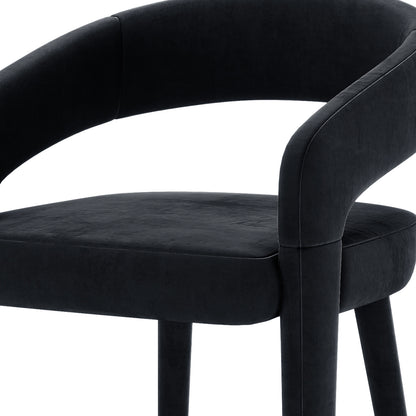 Eisha Velvet Bar Stool Black Set of 2 features luxurious velvet upholstery, a curved back with armrests, and a built-in footrest, offering stylish support and comfort.