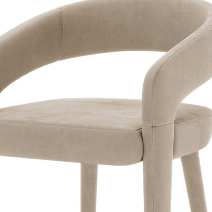 Eisha Velvet Bar Stool Warm Grey Set of 2 featuring luxurious velvet upholstery, curved back with armrests, and a sturdy metal frame. Close-up highlights the plush texture and elegant design details.