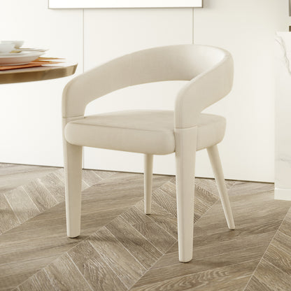 Eisha Velvet Bar Stool Set of 2, featuring plush velvet upholstery, curved backrests, built-in footrest, and sturdy metal frame, on a wood floor, highlighting ergonomic design and modern style.