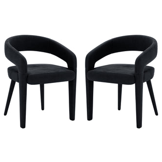 Eisha Velvet Dining Chair Black Set of 2 features sleek black velvet upholstery, curved backrests, and sturdy wooden legs, offering modern elegance and comfort for dining spaces.