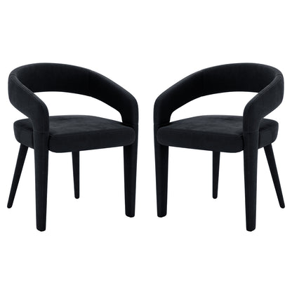 Eisha Velvet Dining Chair Black Set of 2 features sleek black velvet upholstery, curved backrests, and sturdy wooden legs, offering modern elegance and comfort for dining spaces.