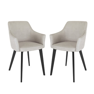 Ella Velvet Dining Chair Set of 2 in Beige features contemporary design with taupe upholstered seats, sleek integrated armrests, and outward-tapered black metal legs, embodying minimalist elegance and comfort.