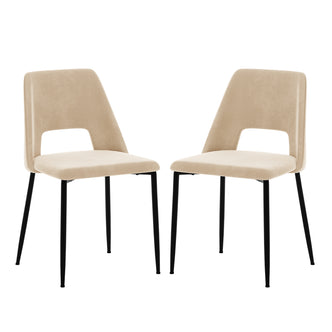Geena High Back Velvet Dining Chair Set of 2 in Oatmeal, featuring beige upholstered seats with lower back cut-outs, slim matte black metal legs, and anti-slip pads for stability and floor protection.