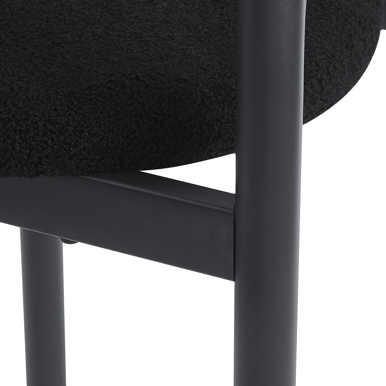 Gilles Boucle Arched Bar Stool Black Set of 2, featuring a sleek black cushion and sturdy metal frame, showcases modern elegance and ergonomic design for comfortable seating in contemporary dining spaces.