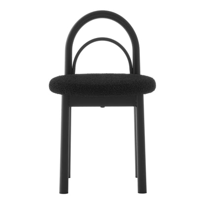 Close-up of the Gilles Boucle Arched Dining Chair Black Set of 2, highlighting the sleek double-arched backrest, upholstered seat with thick foam padding, and sturdy powder-coated metal frame.