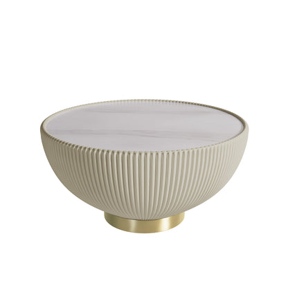 Glalie 70cm Sintered Stone Coffee Table Cream White features a round, bowl-shaped base with vertical fluting, white marble-look top, and brass-tone plinth, offering a stylish, durable centerpiece.