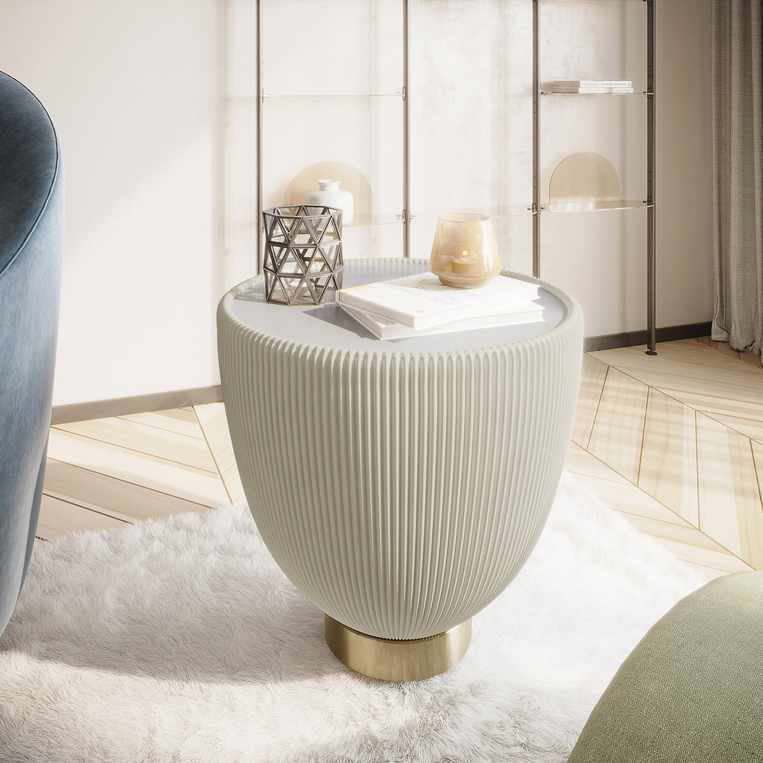 Glalie 47cm Sintered Stone Coffee Table in Cream White features a ribbed urn-like base on a brass pedestal, topped with decor items, set on a plush faux-fur rug in a modern space.
