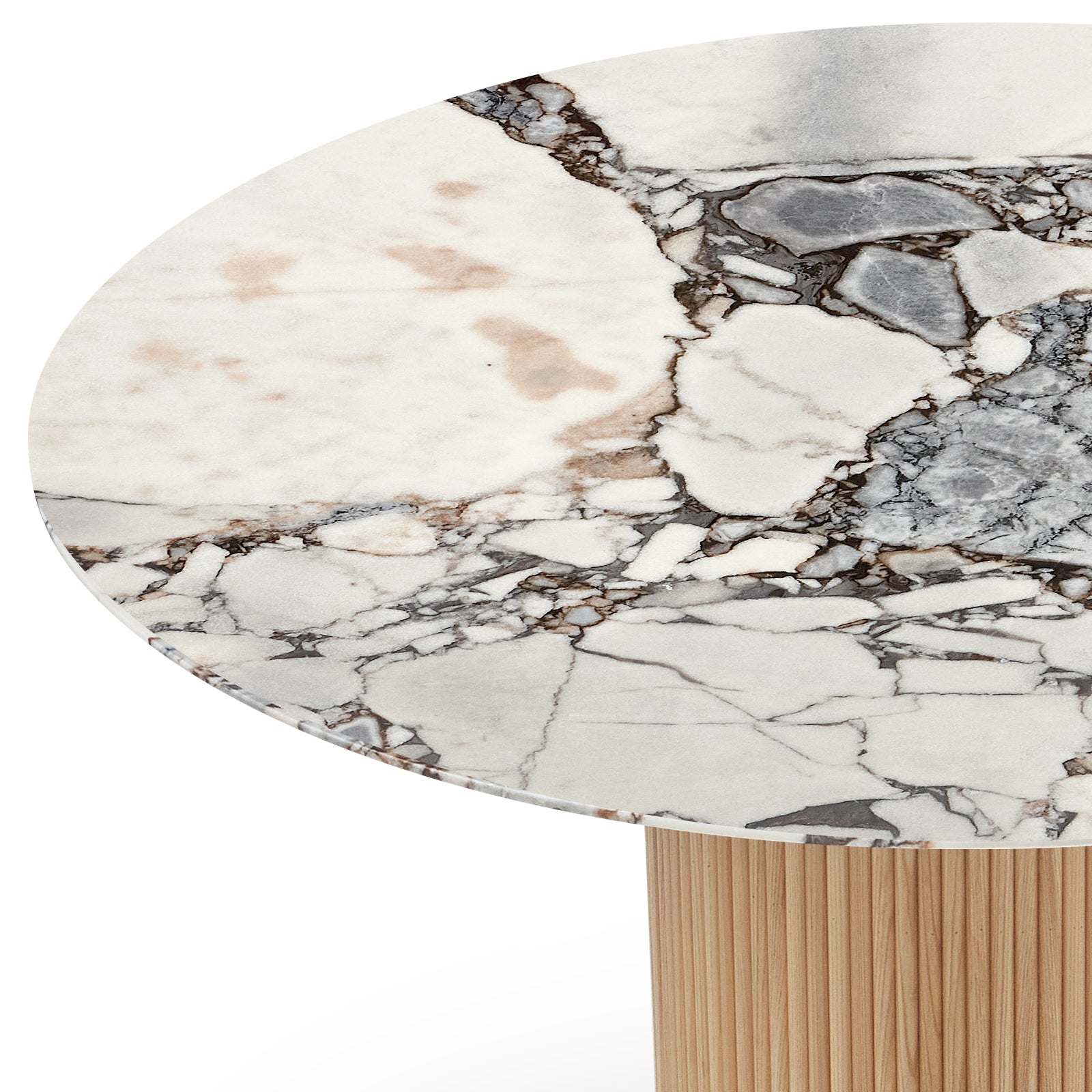Gracie 120cm Round Marble Dining Table in Natural Blue Galaxy, featuring a white marble tabletop with bold gray and brown veining, and a cylindrical, vertically fluted wooden pedestal base.