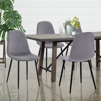 Halsa Velvet Fabric Classic Dining Chair Grey Marle Set of 4, featuring plush velvet upholstery and sturdy black metal legs, elegantly arranged around a dining table showcasing modern and classic design elements.
