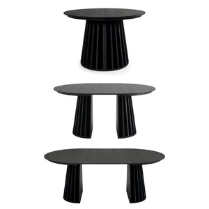 Henri 120cm–200cm Extendable Dining Table in Black styled in a room setting