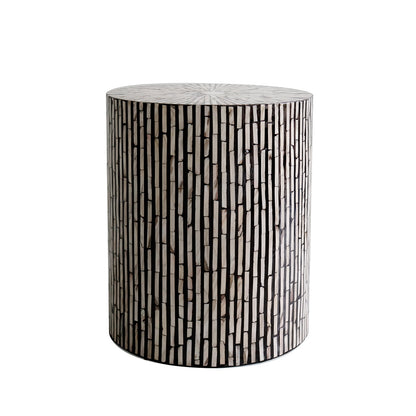 Ivo Mother of Pearl Inlay Side Table in Ivory & Black, featuring a cylindrical design with intricate vertical mosaic inlay and radial top pattern, offering a unique and elegant accent piece.