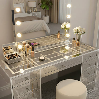 Ivy Diamond Crystal Mirror Finish Hollywood LED Vanity Table features a mirrored design, LED bulb-framed mirror, glass-topped dresser, cushioned stool, and organized beauty items, enhancing your glam routine.