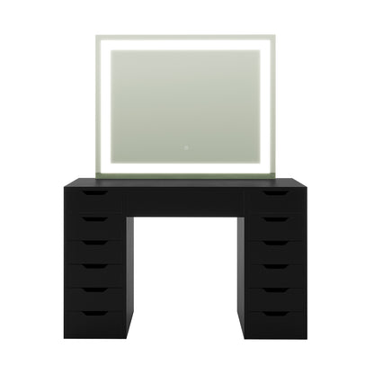 Janika Dressing Table with Storage & LED Lights in Black, featuring a sleek black desk with twelve drawers and a frameless mirror illuminated by an integrated LED light strip for optimal makeup application.