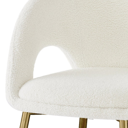 Jazlyn Boucle Dining Chairs with Gold Legs Set of 2 in Cream, featuring plush white boucle upholstery, curved backrest with cut-out, and slender gold-tone metal legs, offering a stylish and comfortable seating option.