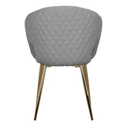 Rear view of Jazlyn Fabric Dining Chairs with Gold Legs Set of 2 in Grey, featuring a quilted barrel-style back and slender gold-toned metal legs, highlighting modern elegance and comfort.