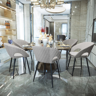 Jazlyn Linen Dining Chair Grey Set of 2, featuring minimalist design with rounded backs, black metal legs, and linen upholstery, perfect for enhancing comfort in dining or living spaces.