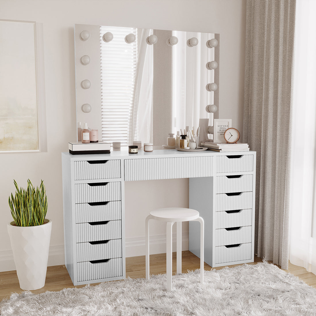 Jenna LED Mirror Dressing Table - Fluted White features a large mirror with 13 LED bulbs and spacious storage drawers, ideal for makeup enthusiasts. Seen are its elegant design and ample tabletop space.