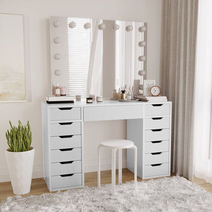 Jenna LED Mirror Dressing Table - Fluted White features a large mirror with 13 LED bulbs and spacious storage drawers, ideal for makeup enthusiasts. Seen are its elegant design and ample tabletop space.