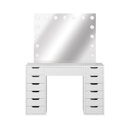 Jenna LED Mirror Dressing Table - Fluted White features a large mirror with 13 LED bulbs, multiple drawers for storage, and a sleek design, perfect for a stylish beauty station.