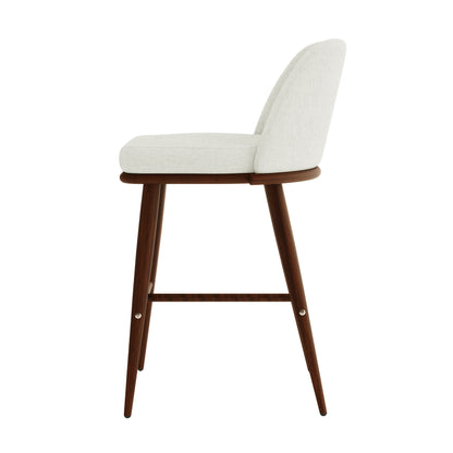 Jeremi High Back Linen Bar Stool Set of 2 in Wheat Walnut, featuring light-colored upholstered seats, low curved backrests, and four tapered wooden legs with a built-in footrest, embodying mid-century-inspired style.
