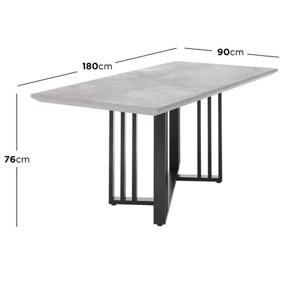 Joel 180cm 4-6 Seater Modern Dining Table in Concrete, featuring a light-grey concrete-effect rectangular tabletop with a geometric black metal base, ideal for contemporary dining spaces. Dimensions: 180 x 90 x 76 cm.