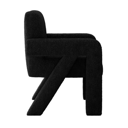 Julie Bouclé Upholstered Accent Chair - Black: A modern black chair with plush bouclé fabric, armrests, and a sleek curved design, perfect for contemporary interiors.