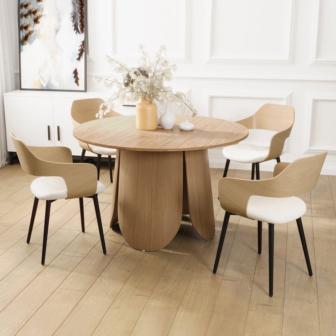 Kaylani & Winfield 5-Piece Wooden Dining Set featuring a round wooden table with white vases on top and boucle cream white chairs, highlighting modern design and cozy farmhouse charm.