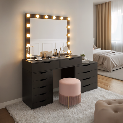 Lassie Hollywood Vanity Dressing Table with Drawers in Black featuring a large mirror with 14 LED lights, multiple drawers, and a sleek tabletop holding makeup essentials and decor.