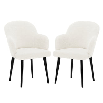 Lennon Bouclé Dining Chair Set of 2 in Cream White, featuring softly curved backrests, integrated armrests in textured bouclé fabric, and supported by slim black legs, offers modern elegance and comfort.