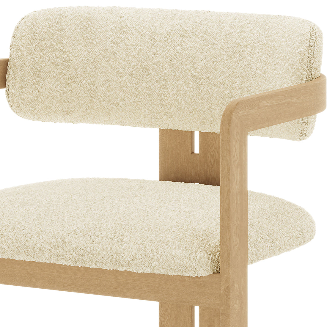 Close-up of the Maddi Boucle Hardwood Dining Chair featuring a curved backrest, soft boucle upholstery, and a solid American wood frame, showcasing its stylish, ergonomic design and durable construction.