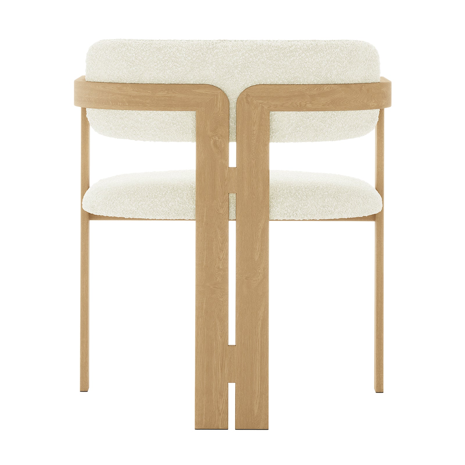 Close-up of the Maddi Boucle Hardwood Dining Chair showcasing its curved backrest, soft boucle upholstery, and sturdy American wood frame, highlighting its stylish and ergonomic design.