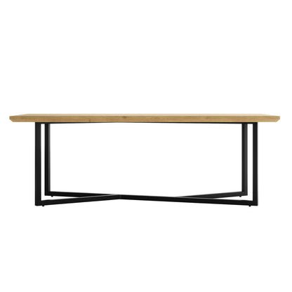 Mae 220cm 8 Seater Rectangular Dining Table in Natural, featuring a light-stained wood slab tabletop on a black powder-coated metal base with intersecting U-shaped supports, showcasing modern design.