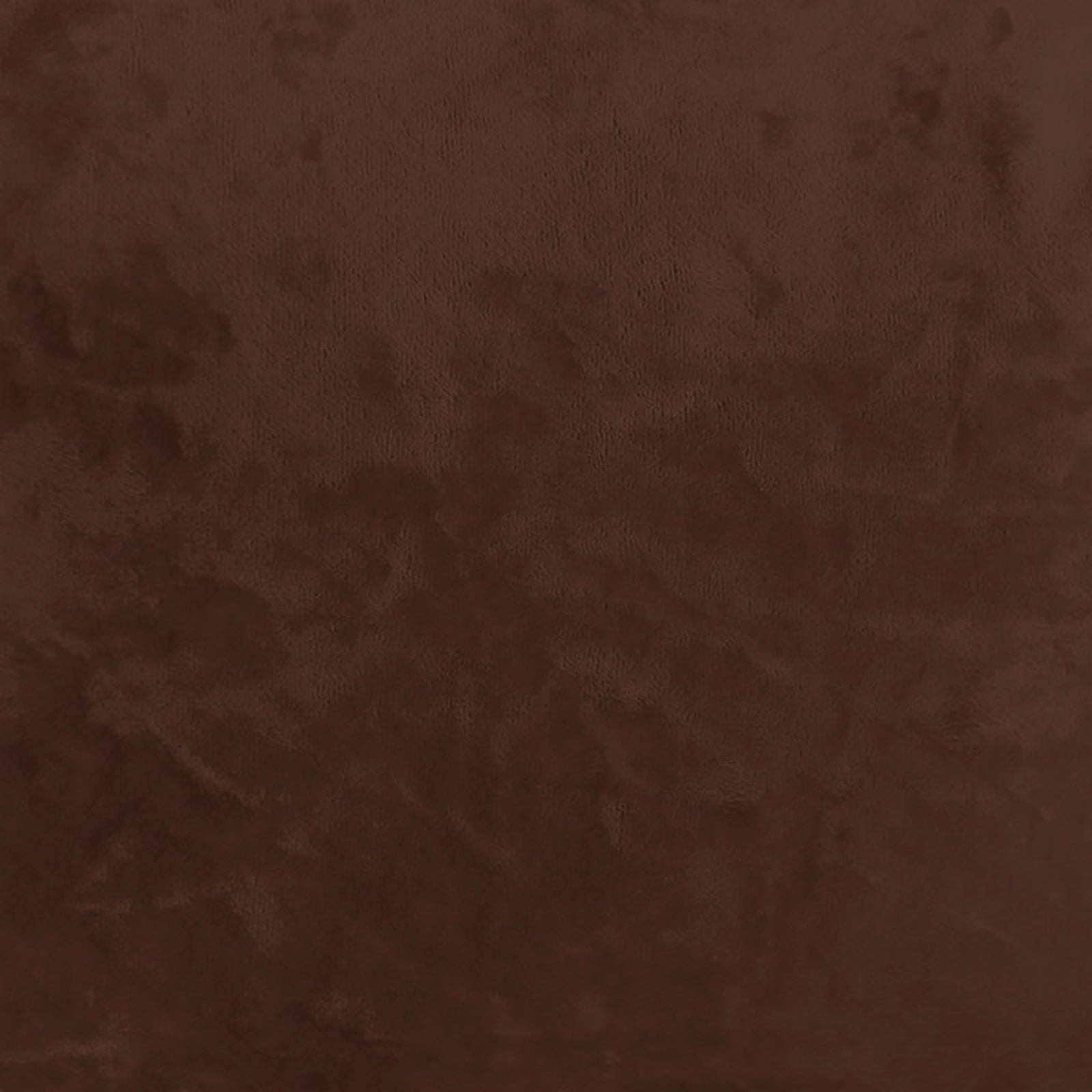 Close-up of the Mariah Velvet Upholstered Accent Chair - Mocha Mousse, showcasing its textured, mottled leather-like surface, emphasizing the luxurious finish and inviting tactile experience.