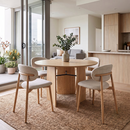 Marta 120cm 4 Seater Round Dining Table in Natural styled in a room setting