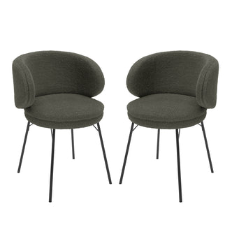 Meily Boucle Dining Chair Set of 2 in Green, featuring rounded upholstered seats and curved wrap-around backrests in boucle fabric, supported by slender black metal legs for a modern, stylish look.