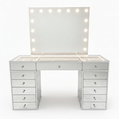 Monroe Hollywood Makeup Dressing Table in Silver with a mirrored design features a flip-up LED bulb mirror, nine drawers, and a glass-topped surface with internal compartments for organized cosmetic and jewelry storage.