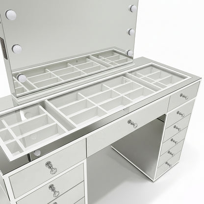 Monroe 13 Drawer Mirror Finish Hollywood LED Dressing Table with light-bulb-framed mirror, glass-topped organizer, crystal-style drawer pulls, and integrated power features, creating a luxe beauty setup.