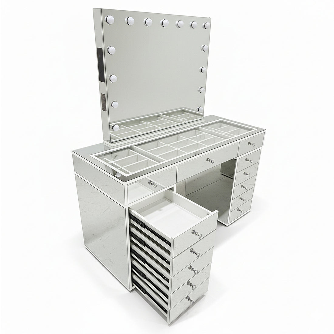 Monroe Hollywood Makeup Dressing Table in Silver featuring a frameless mirror with vanity bulbs, glass-topped counter with compartments, multiple drawers, and a pull-out drawer tower.