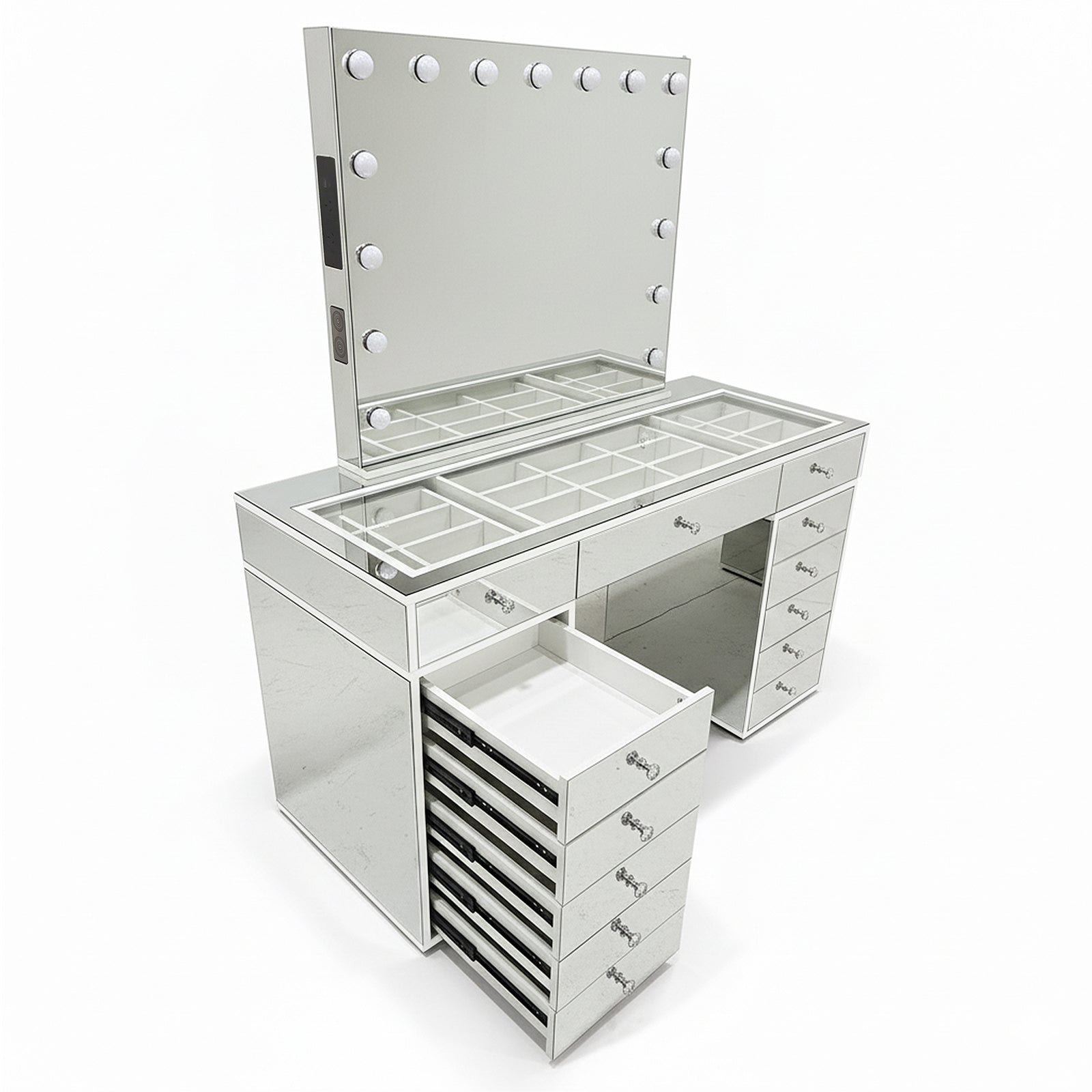 Monroe Hollywood Makeup Dressing Table in Silver featuring a frameless mirror with vanity bulbs, glass-topped counter with compartments, multiple drawers, and a pull-out drawer tower.