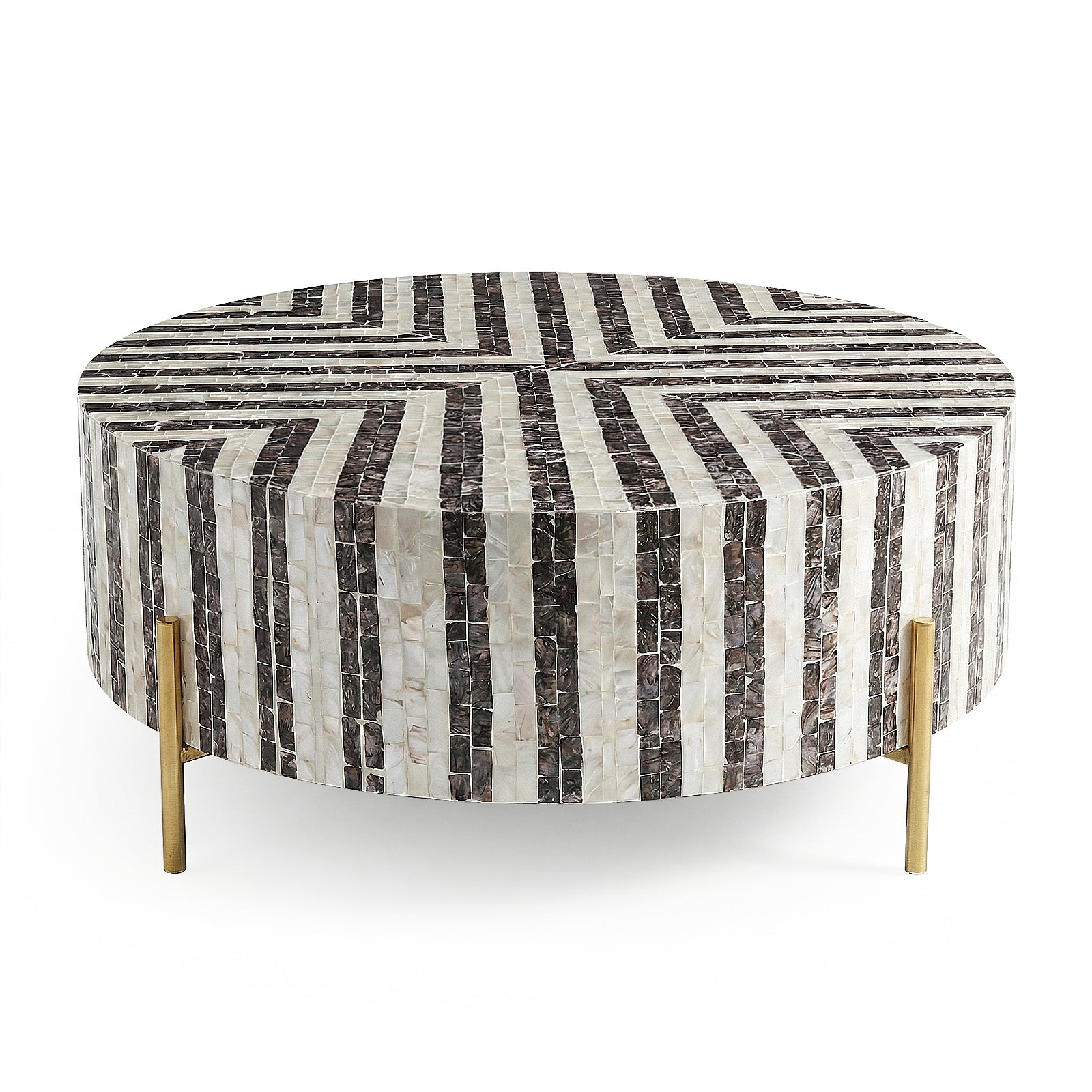 Round black and white striped coffee table with gold legs on white background