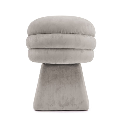 Back view of the grey swivel dining chair showing its horizontal tiered channeled detailing.   